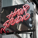 An image of hair studio neon sign for AHP blog
