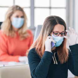 An image of friends wearing masks