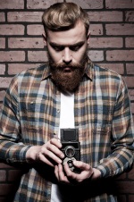 hipster man with old camera