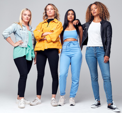 A stock image of four women looking down at camera