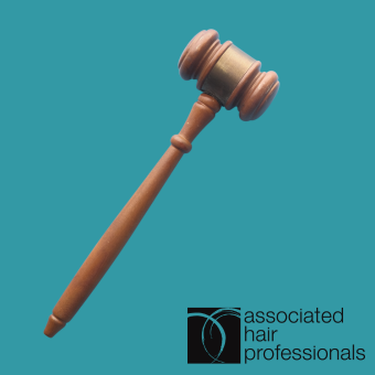 Brown gavel over teal background with AHP logo