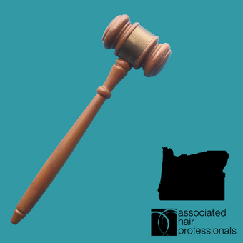 Brown gavel over teal background with shape or Oregon