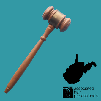 Brown gavel over teal background.