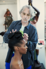 image of male hairdresser working with client