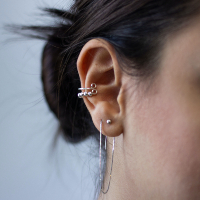 An image of womans ear and earing for ahp blog