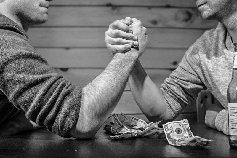A stock image of two men arm wrestling