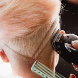 An image of ahp member shaving head service