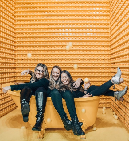 An image of AHP hairstylists in bathtub for influencer campaign