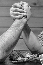 A stock image of two men arm wrestling
