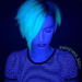 A blue light image of blond girl