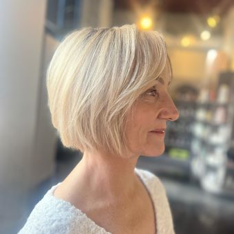 Client after getting her hair cut and styled