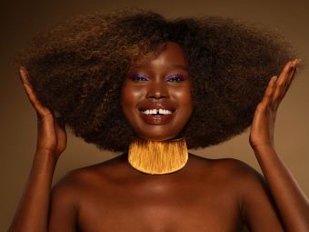 Hair stylist works with textured hair.