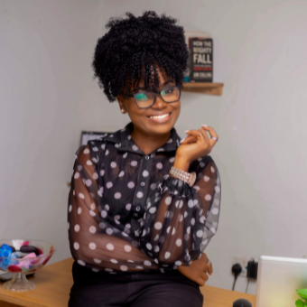 Business woman sits on her desk