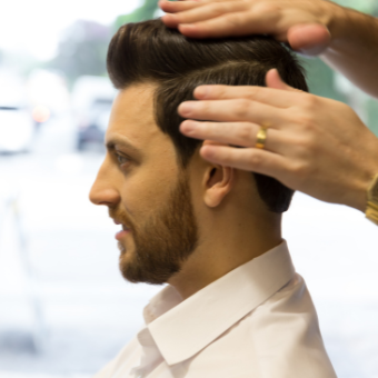 Male Client gets his hair styled