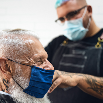 AHP Barber member shaves a beard