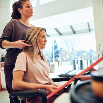 Woman gets hair styled