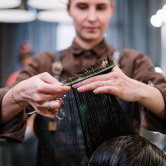 hairdresser cutting hair