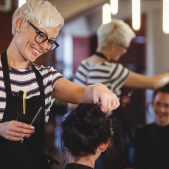 hairstylist working on a client