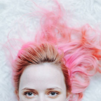 Modern ahp member young woman with pastel pink hair